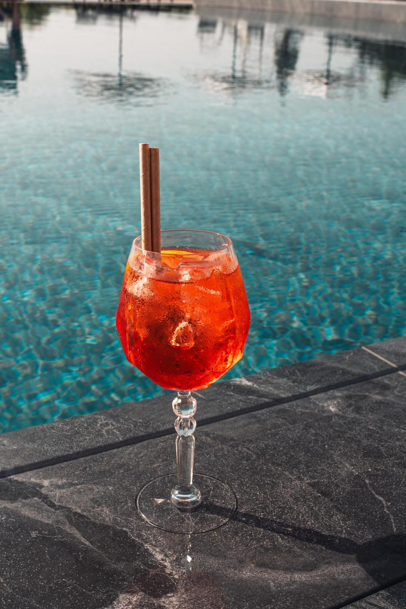 Mk Hotel Tirana Rinas Exterior photo A glass of Aperol Spritz